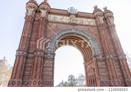 The Arc de Triomphe. Monument located at the confluence between Paseo de Lluis Companys, Paseo de San Juan and Ronda de San Pedro, in the city of Barcelona. BARCELONA, SPAIN - JANUARY. 21, 2024. 110808083