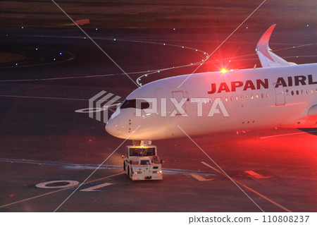 Haneda Airport at night, passenger plane heading for night flight, international flight departure Haneda Airport at night, passenger plane heading for night flight, international flight departure 110808237