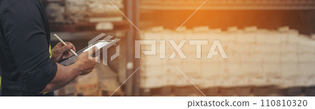 Banner Close up Hispanic men hands using pen touch smart tablet Warehouse management logistics counting checking products on inventory shelf. Man hands worker check stock control with copy space 110810320