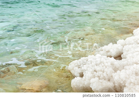 Deposits of mineral salts on the bea , typical landscape of the Dead Sea in Jordan. Deposits of mineral salts on the bea , typical landscape of the Dead Sea in Jordan. 110810585