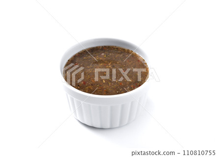 Green Chimichurri Sauce isolated on white background Green Chimichurri Sauce isolated on white background 110810755