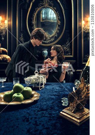 Photo story in lifestyle magazine about elite social scene. Romantic film scene depiction with drama theme. 110810806