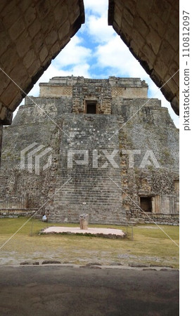 Uxmal ruins, Pyramid of the Wizard seen from the Mayan arch [Mexico] 110812097