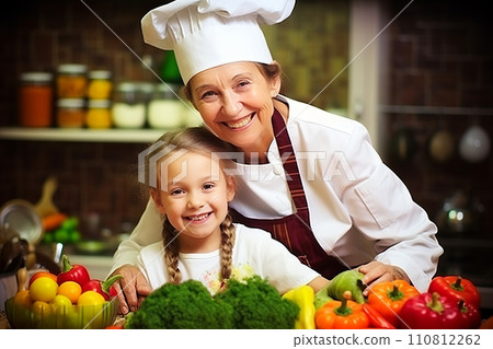 Happy grandmother and granddaughter bonding over cooking vegan vegetables in the kitchen 110812262
