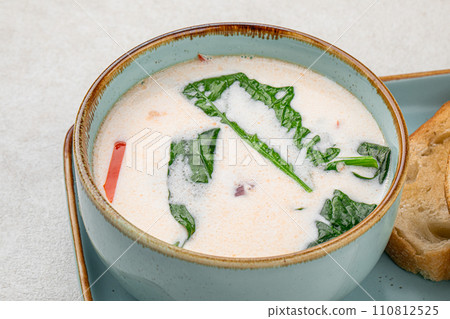 Portion of gourmet salmon creamy soup Portion of gourmet salmon creamy soup 110812525