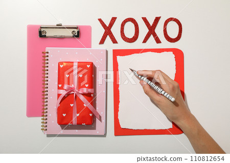 Notepad, letter and other accessories for Valentine's Day. Notepad, letter and other accessories for Valentine's Day. 110812654
