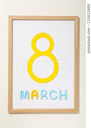 Paper number eight, with the inscription March in a wooden frame Paper number eight, with the inscription March in a wooden frame 110812669