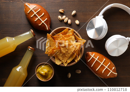 Rugby ball buns with beer and chips Rugby ball buns with beer and chips 110812718