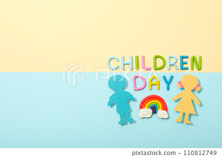 The inscription Children's Day with paper figures of children 110812749