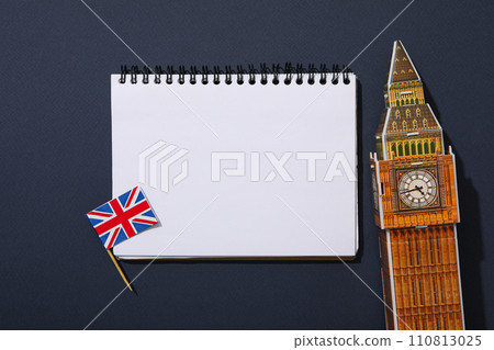 The concept of learning English, a notebook on a blue background. 110813025