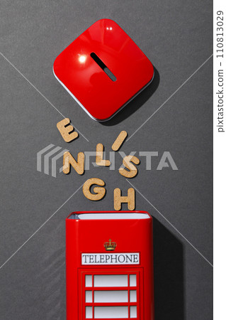 Telephone booth and the word "English" on a dark background. 110813029