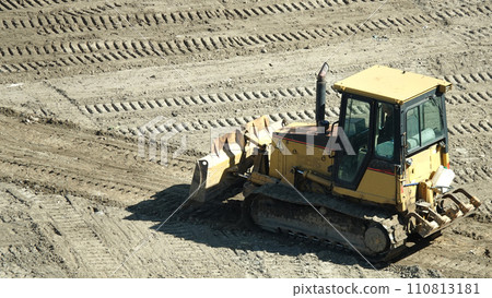 Kiev, Ukraine March 13, 2019: Tractors and excavators work on the construction of the foundation zero cycle Kiev, Ukraine March 13, 2019: Tractors and excavators work on the construction of the foundation zero cycle 110813181