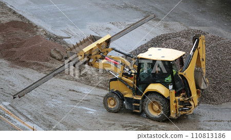 Kiev, Ukraine March 13, 2019:  Tractors and excavators work on the construction of the foundation zero cycle 110813186