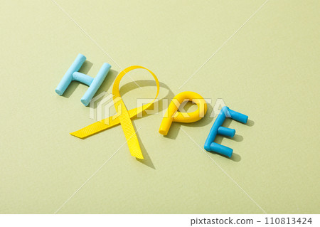 The inscription hope with a yellow ribbon The inscription hope with a yellow ribbon 110813424