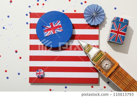 Big Ben with the flag of Great Britain on a light background. 110813793