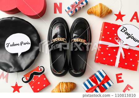 French beret, loafers and expressions, concept of learning French. French beret, loafers and expressions, concept of learning French. 110813810