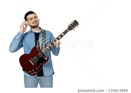 PNG,Attractive young guy playing the guitar, isolated on white background PNG,Attractive young guy playing the guitar, isolated on white background 110813894