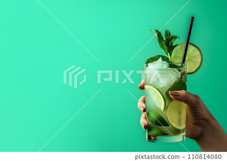 AI-generated content. Summer concept - hand holding mojito cocktail, solid color background AI-generated content. Summer concept - hand holding mojito cocktail, solid color background 110814080