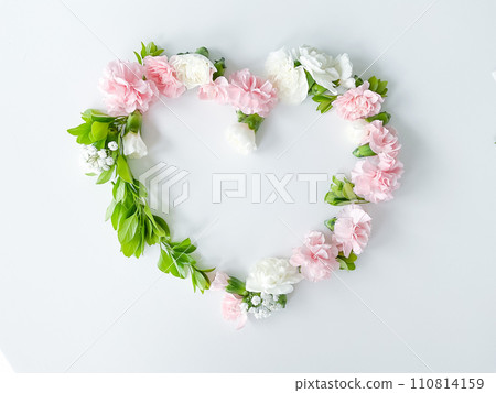 Frame in form of heart from pink, white carnations 110814159