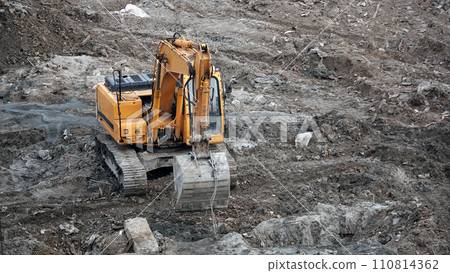 Kiev, Ukraine, October 17, 2018: Workers in the mud of a construction site at the stage of excavation; construction of a supermarket AUCHAN 110814362