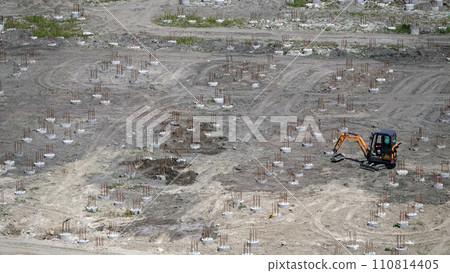 Kiev, Ukraine, October 17, 2018: Workers in the mud of a construction site at the stage of excavation; construction of a supermarket AUCHAN 110814405