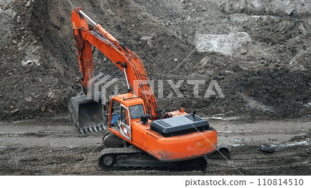 Kiev, Ukraine March 13, 2019: Workers repair equipment on the construction of the zero cycle foundation of the entertainment center 110814510