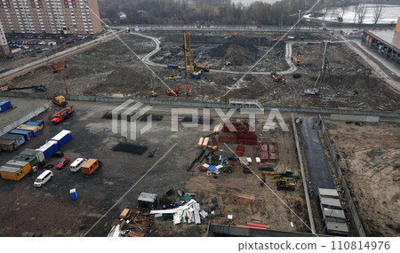Kiev, Ukraine March 13, 2019:  Workers and machinery - zero-cycle construction of the foundation of an entertainment center 110814976