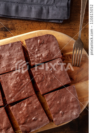 Chocolate brownie, simple coffee cake, overhead flat lay view Chocolate brownie, simple coffee cake, overhead flat lay view 110815052