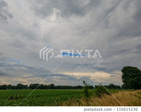 Calm Before the Storm: Farmland and Approaching Clouds 110815230