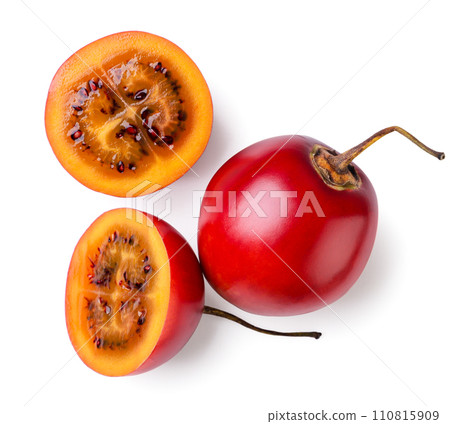 Tamarillo and two halves on a white background. Top view Tamarillo and two halves on a white background. Top view 110815909