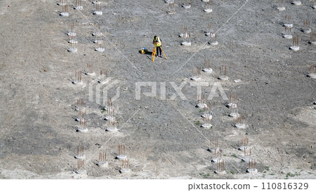 Kiev, Ukraine March 13, 2019: Workers - zero-cycle construction of the foundation of an entertainment center Kiev, Ukraine March 13, 2019: Workers - zero-cycle construction of the foundation of an entertainment center 110816329