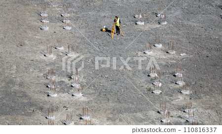 Kiev, Ukraine March 13, 2019: Workers - zero-cycle construction of the foundation of an entertainment center Kiev, Ukraine March 13, 2019: Workers - zero-cycle construction of the foundation of an entertainment center 110816337