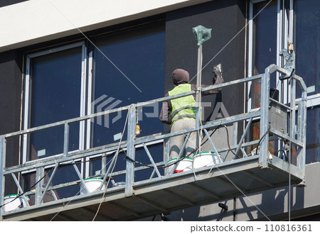 Kiev, Ukraine March 18, 2020: Workers at high altitude 110816361