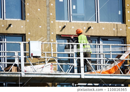 Kiev, Ukraine March 18, 2020: Workers at high altitude 110816365