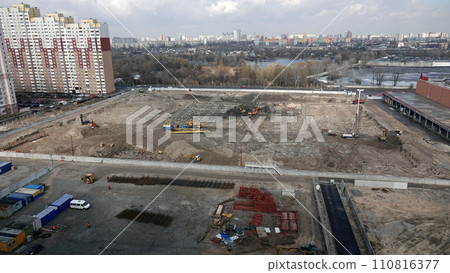 Kiev, Ukraine March 13, 2019:  Tractors and excavators work on the construction of the foundation zero cycle 110816377