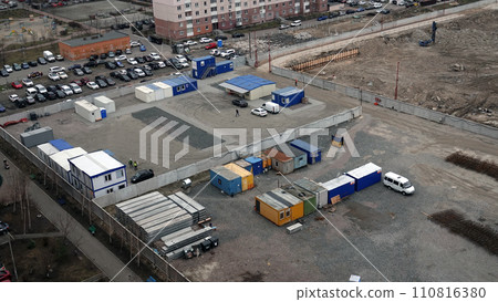 Kiev, Ukraine March 13, 2019: Tractors and excavators work on the construction of the foundation zero cycle Kiev, Ukraine March 13, 2019: Tractors and excavators work on the construction of the foundation zero cycle 110816380