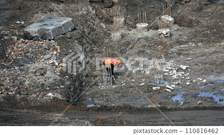 Kiev, Ukraine March 13, 2019:  Workers - zero-cycle construction of the foundation of an entertainment center 110816462