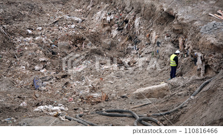 Kiev, Ukraine March 13, 2019: Workers - zero-cycle construction of the foundation of an entertainment center Kiev, Ukraine March 13, 2019: Workers - zero-cycle construction of the foundation of an entertainment center 110816466