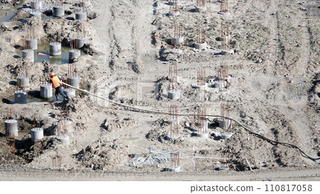 Kiev, Ukraine March 13, 2019: Workers - zero-cycle construction of the foundation of an entertainment center Kiev, Ukraine March 13, 2019: Workers - zero-cycle construction of the foundation of an entertainment center 110817058