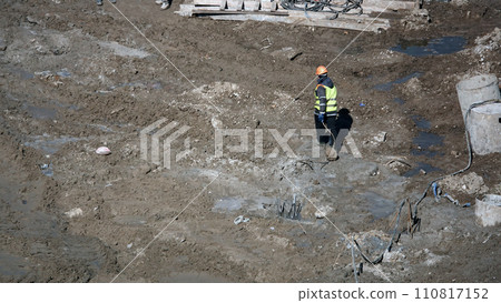 Kiev, Ukraine March 13, 2019: Workers - zero-cycle construction of the foundation of an entertainment center Kiev, Ukraine March 13, 2019: Workers - zero-cycle construction of the foundation of an entertainment center 110817152