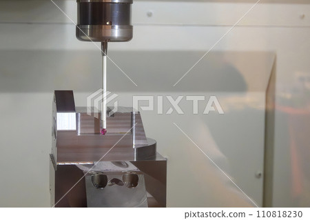 The CMM probe measuring the mold parts on machining center. The CMM probe measuring the mold parts on machining center. 110818230