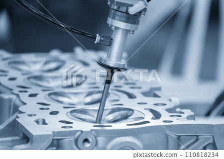 The intake and exhaust vale assembly process by robotic system in the light blue scene. 110818234