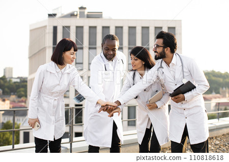 Meeting of multinational doctors in modern clinic during break. Meeting of multinational doctors in modern clinic during break. 110818618