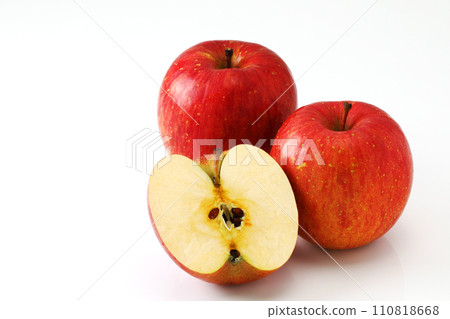Apples and sliced apples on white background 110818668