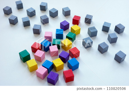 Gray and multi-colored cubes as a symbol of diversity and the fight for equal rights. Gray and multi-colored cubes as a symbol of diversity and the fight for equal rights. 110820506