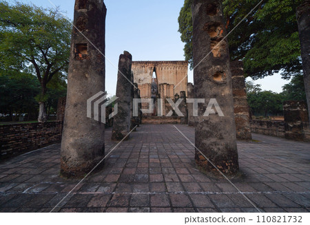 The buddha in Wat Si Chum in Sukhothai Historical Park, pagoda stupa, Sukhothai, Thailand. Thai buddhist temple architecture. Tourist attraction. 110821732