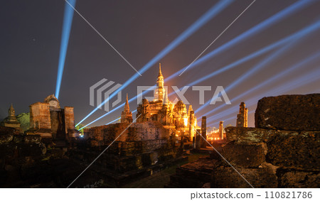Sukhothai Historical Park festival, buddha pagoda stupa in a temple, Sukhothai, Thailand. Thai buddhist temple architecture at night. Tourist attraction. 110821786