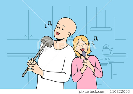 Hairless boy and little girl sing while standing in kitchen, use utensils instead of microphone Hairless boy and little girl sing while standing in kitchen, use utensils instead of microphone 110822093