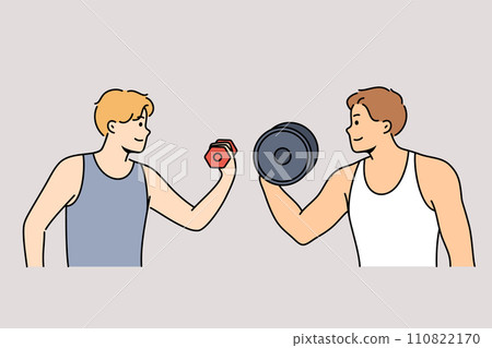 Sports competition between men lifting dumbbells with different weights or fitness mentoring in gym Sports competition between men lifting dumbbells with different weights or fitness mentoring in gym 110822170