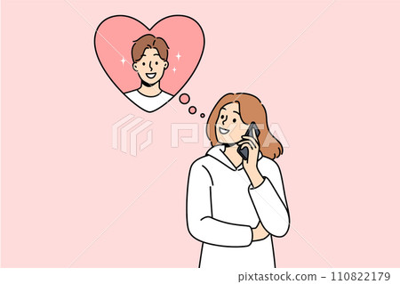 Woman makes phone call to boyfriend, wanting to flirt or invite him to romantic weekend dinner 110822179